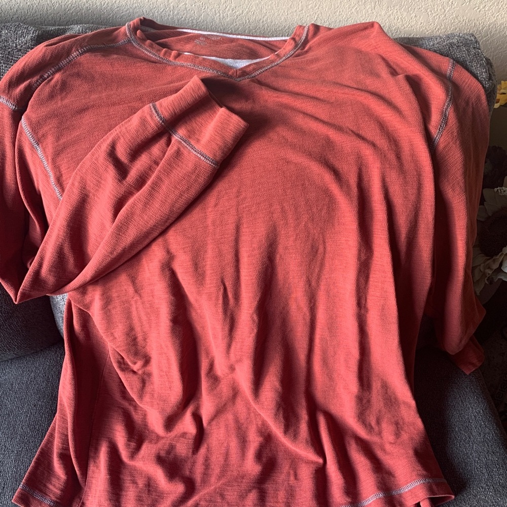 Long sleeves. Orange color. Not sure of the brand - Picture 1 of 4